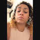 In this action-packed clip, a black girl records herself shitting into a toilet in 4 scenes featuring poop action from a rear perspective. Presented in 720P vertical HD format. About a minute.